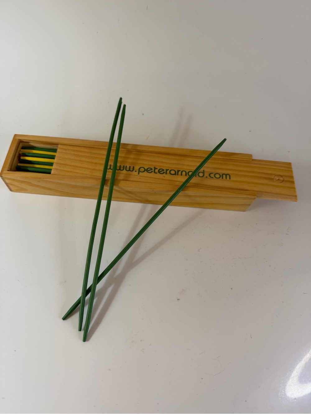 Vintage Peter Arnold wooden box with pickup sticks and instructions